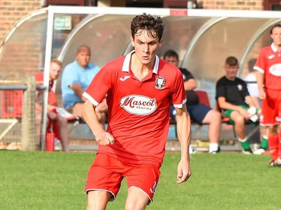 Jack Troak's clever quick throw started the move which saw Hassocks score their second goal in their 3-0 win at Horley Town. Picture by Chris Neal