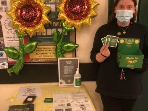 Seeds of hope! Olivia Coffey, cash office assistant at Morrisons in St James Street.