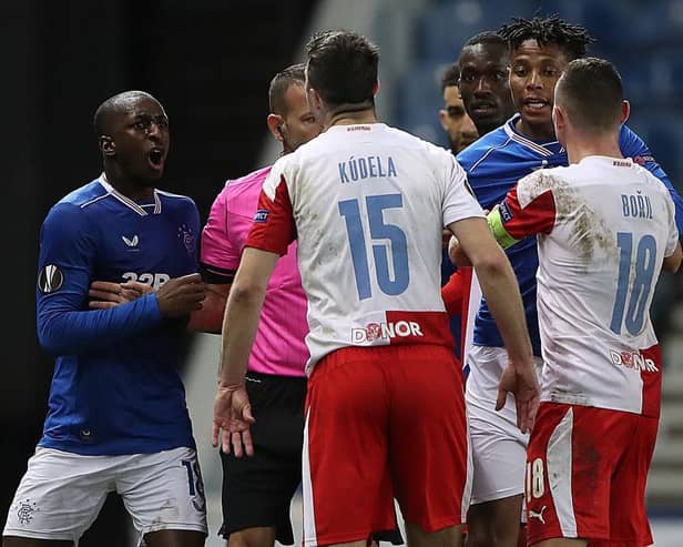 Glen Kamara of Rangers clashes with Ondrej Kudela of Slavia Prague during the  Europa League Round of 16 Second Leg match at Ibrox Stadium on March 18