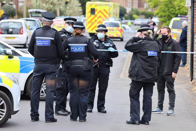 A large number of police officers have been pictured at the scene. Photo: Eddie Mitchell