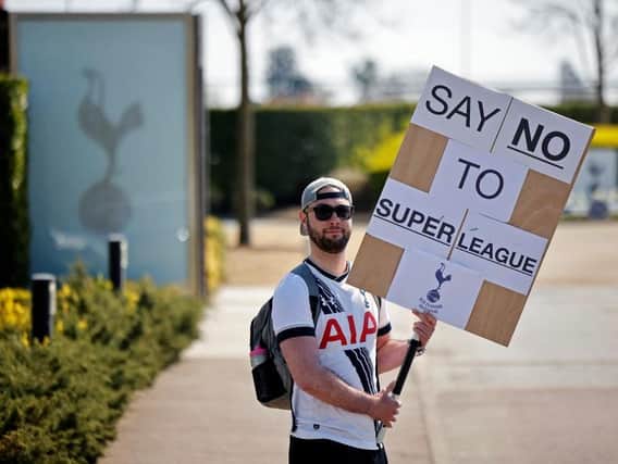 A Tottenham supporter unhappy at the proposed plans for the European Super League