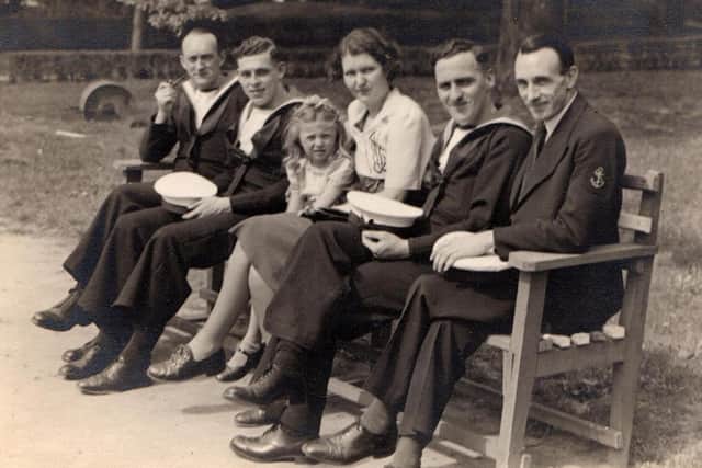 Mrs Eleanor Casey and daughter Peggy with four of the sailors, John Currie, John McNair, Geoffrey Hawkesworth and Tom Le Poidevin, in a New York park