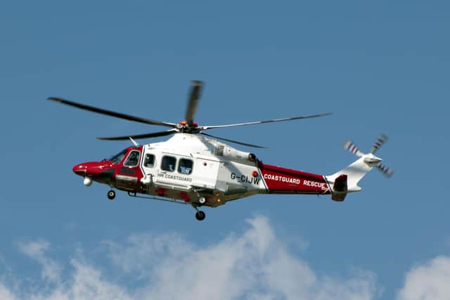 Coastguard helicopter. SUS-150921-073106001