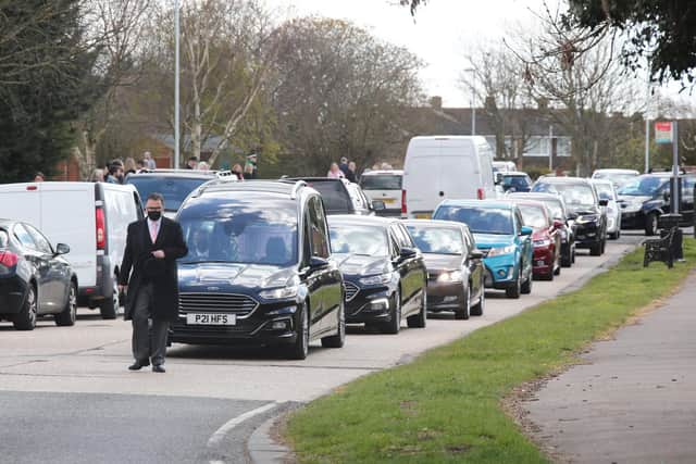 Dozens of people came out to pay their respects on the day of Sue Murrell's funeral