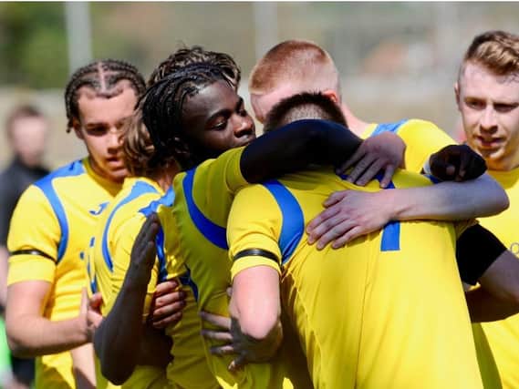The Lancing players celebrate Mo Juwara's equaliser against Flackwell Heath / Picture: Stephen Goodger