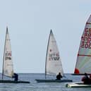 Winners of the three race handicap, Margaret and Philip Blurton, sail their Tasar in the foreground. Photo: Rick Pryce