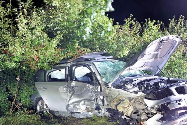 The BMW 116 after the head-on crash with Karaloucas' car. The BMW driver suffered multiple fractures and was taken to hospital. Photo by Sussex Police SUS-210423-164507001