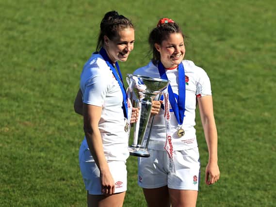 Emily Scarratt and Jess Breach with the hard-won Six Nations trophy / Picture: Getty