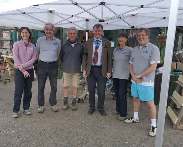 Dr Tim Fooks with the five trustees at Horsham & Shipley Community Project SUS-210405-105923001