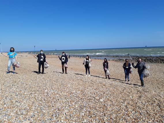 National Citizenship Service volunteers on Eastbourne BEACH SUS-210426-122925001