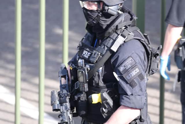 Armed officers at Crawley College