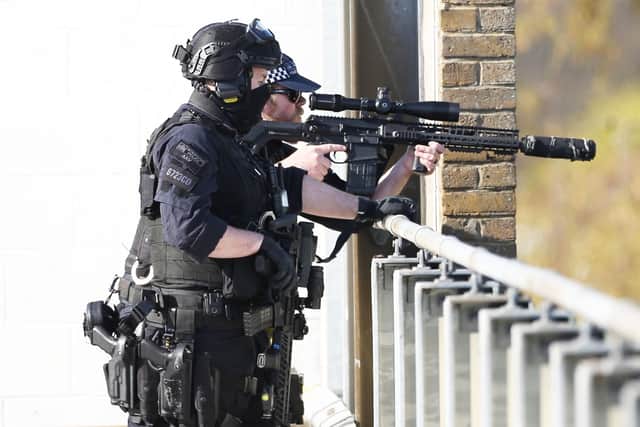 Armed officers in Crawley