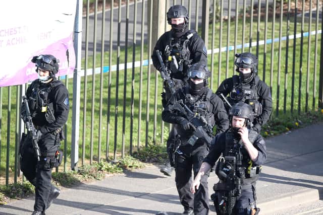 Armed police at the scene