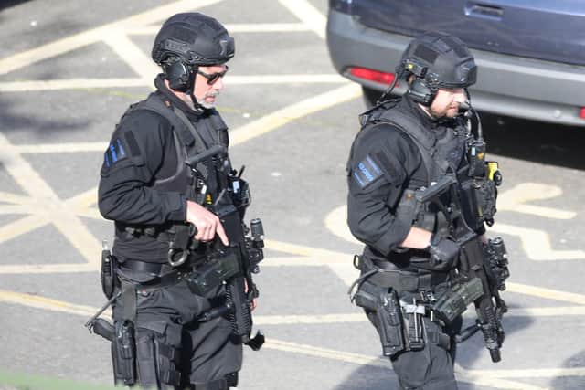 Officers at the scene on Monday