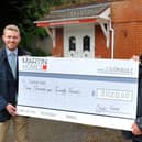 Cheque presentation from Raphael Beck of Martin Homes to  Paul Huggett - Founder of Cancervive. Pic S Robards SR2104282 SUS-210428-162524001