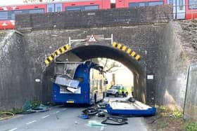 The bus that crashed into the railway bridge in Rocky Lane, Haywards Heath. Picture: Eddie Mitchell