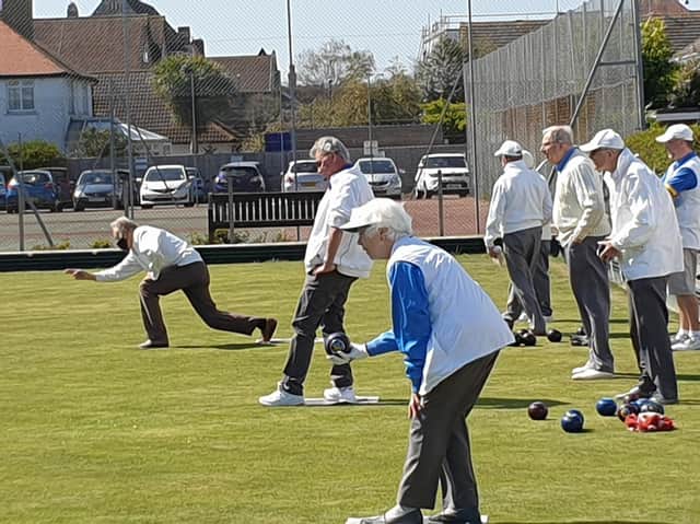 A busy bowling green on the opening day at Pagham BC at Swansea Gardens