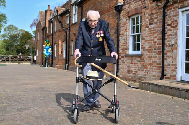 Captain Sir Tom Moore completed 100 laps of his garden April 16. (Photo by JUSTIN TALLIS/AFP via Getty Images) PPP-210427-141307003