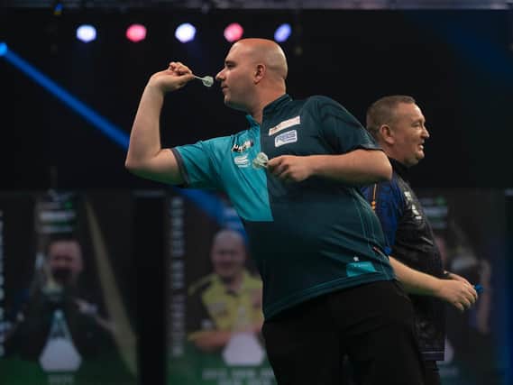 Rob Cross in Premier League action against Glen Durrant last week / Picture: Lawrence Lustig-PDC