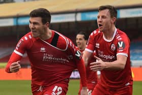 Jordan Tunnicliffe (left) celebrates scoring Crawley Town's third goal in the famous 3-0 win over Leeds United in the FA Cup third round in January. Picture by Glyn Kirk/AFP via Getty Images