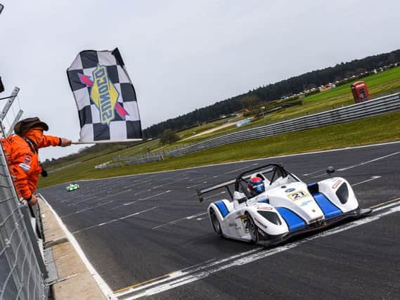 Will Hunt takes the chequered flag / Picture: Ollie Read Photography