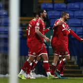 Captain George Francomb celebrates putting Crawley Town 1-0 up in their game at Bolton Wanderers in January. Picture by Chris Donnelly/MI News/NurPhoto via Getty Images