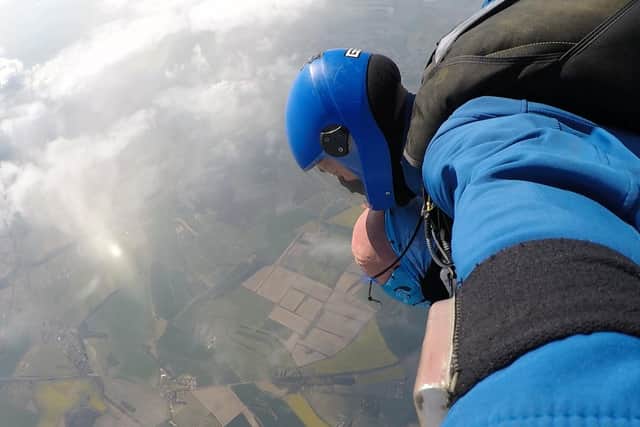Senior security officer Daren Cheeseman from the Orchards shopping centre in Haywards Heath does a charity skydive for St Catherine's Hospice. Picture: GoSkydive