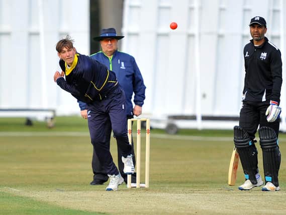 Josh Haywards bowling for Cuckfield CC in their T20 Cup clash against Roffey CC. Pictures by Steve Robards