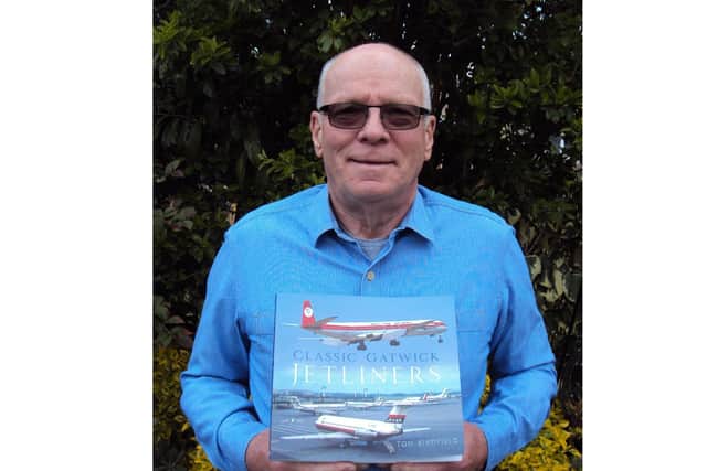 Horsham author Tom Singfield with his latest book about aviation SUS-210505-120143001