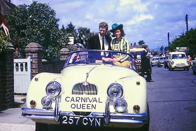 Mary and Ed in the E-type jaguar selected for the Carnival Queen