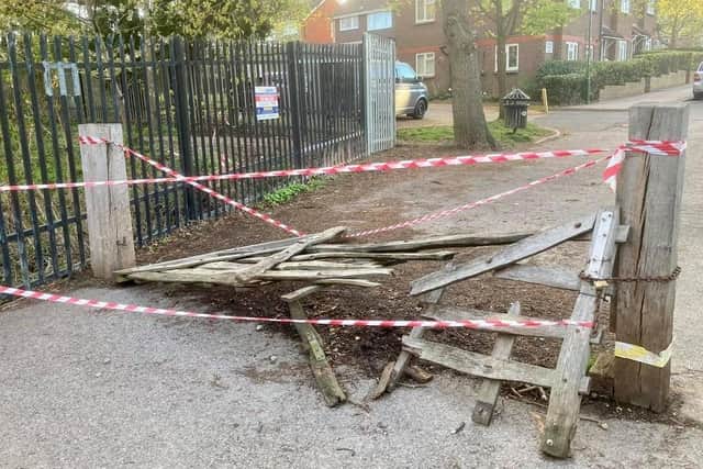 The broken gate at the bottom of Ashenground Road. Picture: Marc Dickson