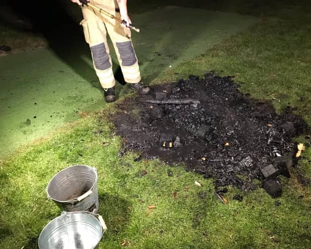 The deliberate fire involved pallets which damaged a school playing field. Picture: Billingshurst Fire Station