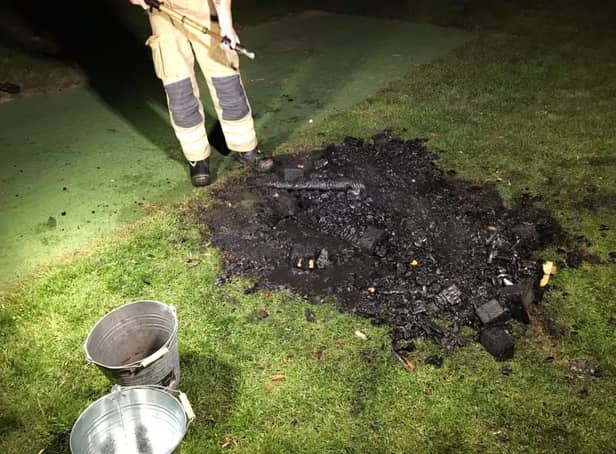 The deliberate fire involved pallets which damaged a school playing field. Picture: Billingshurst Fire Station