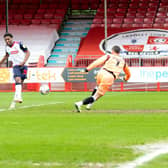 Dapo Afolayan adds Bolton's second in their 4-1 win over ten-man Crawley Town. Pictures by Jamie Evans/UK Sports Images Ltd