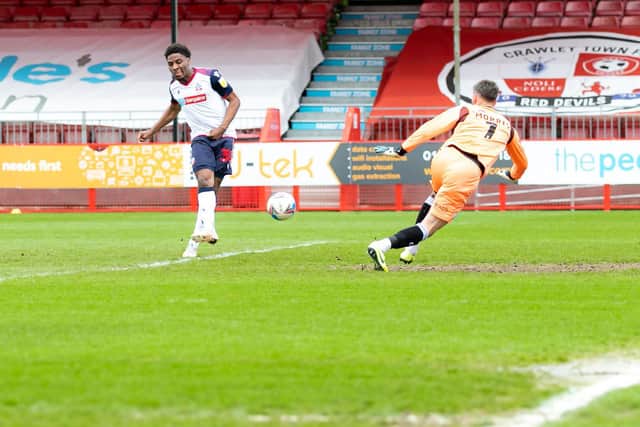 Dapo Afolayan adds Bolton's second in their 4-1 win over ten-man Crawley Town. Pictures by Jamie Evans/UK Sports Images Ltd