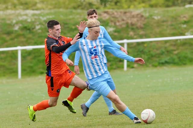 Action from Midhurst's win at Worthing in the SCFL Shield / Picture: Stephen Goodger
