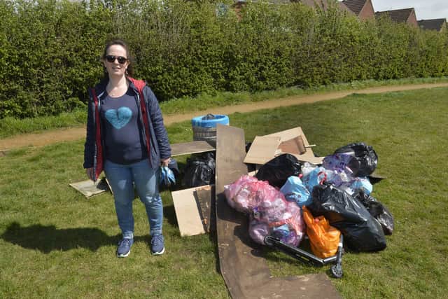 Jenny Wallace-Elliott next to some of the rubbish that her and other residents from Patcham Mill Estate collected in Adur Park (Photo by Jon Rigby). SUS-211105-090912001