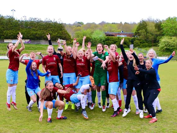 The Hastings United Women's team's championship celebrations are under way / Picture: Joe Knight