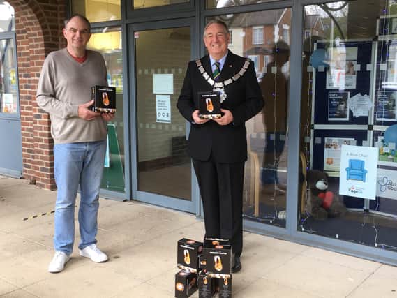 Town mayor, councillor John Dabell, with Barry Gilbert, chief operations manager at Age UK East Grinstead and District SUS-210518-102731001