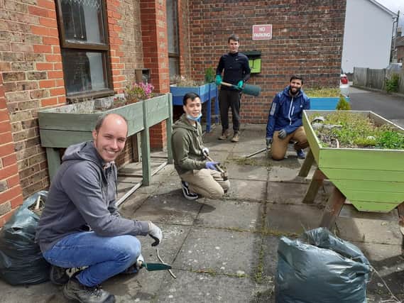 UK Power Networks Services volunteers working at Age UKs Cherry Tree Centre ahead of its reopening SUS-210518-131514001