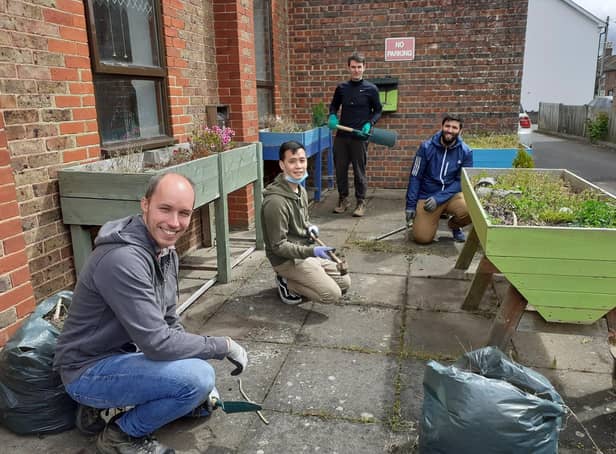 UK Power Networks Services volunteers working at Age UKs Cherry Tree Centre ahead of its reopening SUS-210518-131514001