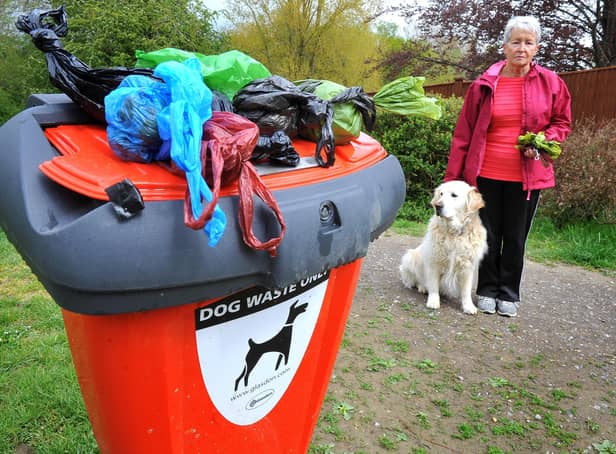 Carole Burgess is fed up with overflowing dog poo bins. Pic S Robards SR2105131 SUS-210513-161221001