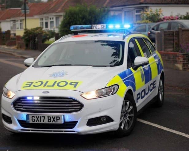 A Sussex Police car. SUS-211003-192626001