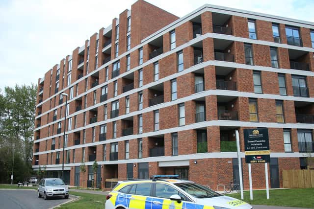 Police at the flats yesterday. Picture by Eddie Mitchell