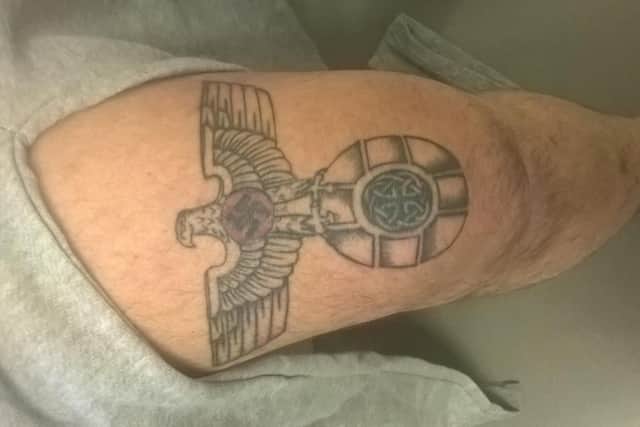 Powell, 33, sent a series of tweets including showing a photo of his Nazi tattoo and and said: ‘Civil war is the only way... at first it will be a blood bath’. Photo: CTPSE