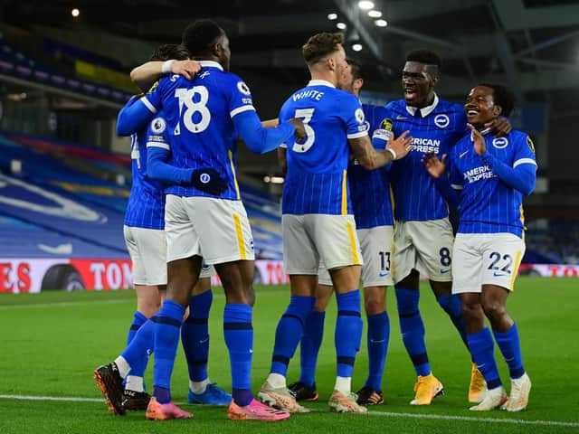 Percy Tau (right) provided the assist for Danny Welbeck's goal (Photo by Mike Hewitt/Getty Images)