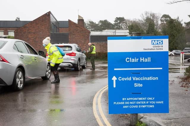 Arrivals at the Covid-19 vaccination site at Clair Hall, Haywards Heath. Picture: Mike Anton