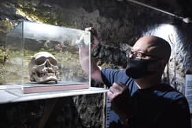 The True Crime Museum in Hastings getting ready to reopen on May 17 after the easing of lockdown restrictions.Curator Joel Griggs with the skull of Louis Lefèvre SUS-210514-130228001