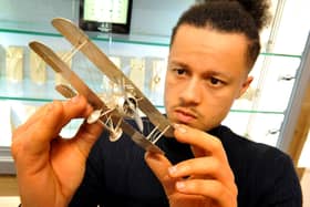 Hugo Johnson from RTFJ won the final of All That Glitters on BBC Two. He is pictured here with a highly detailed biplane that he created. Picture: Steve Robards