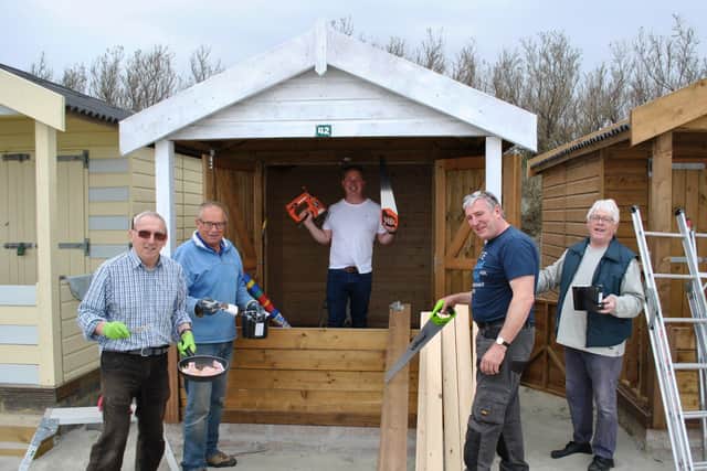 Chichester Rotarians Ray Richardson, Peter Haydn Jones, Tim Reedman, Neil Hughes and Trevor Ware, kitting out Chichester Boys Club’s new beach hut at West Wittering beach